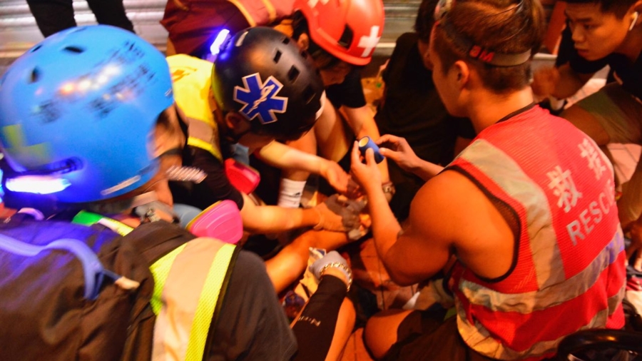 14-Year-Old Shot, Reportedly by Off-Duty Police Officer, During Hong Kong Clashes