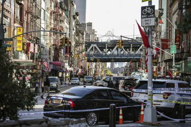 New York Police Department officers investigate the scene of an attack in Manhattan's Chinatown neighborhood in New York City on Oct. 5, 2019. (Jeenah Moon/AP Photo)