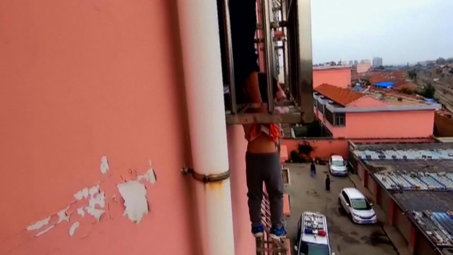 Chinese Boy, 4, Dangles From Fourth-Story Window After Head Gets Stuck