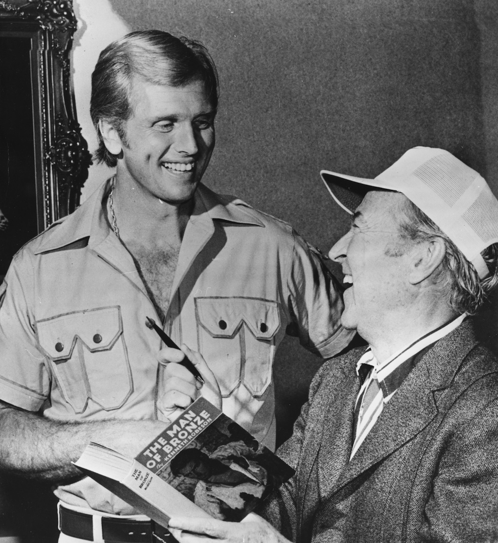 Actor Ron Ely discussing his role in the film 'Doc Savage: The Man of Bronze' with producer George Pal, Hollywood, circa 1975. (Photo by Keystone/Hulton Archive/Getty Images)