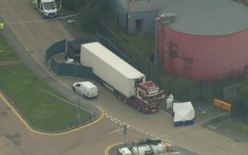 Suspect Arrested After 39 Bodies Found in a Truck Container