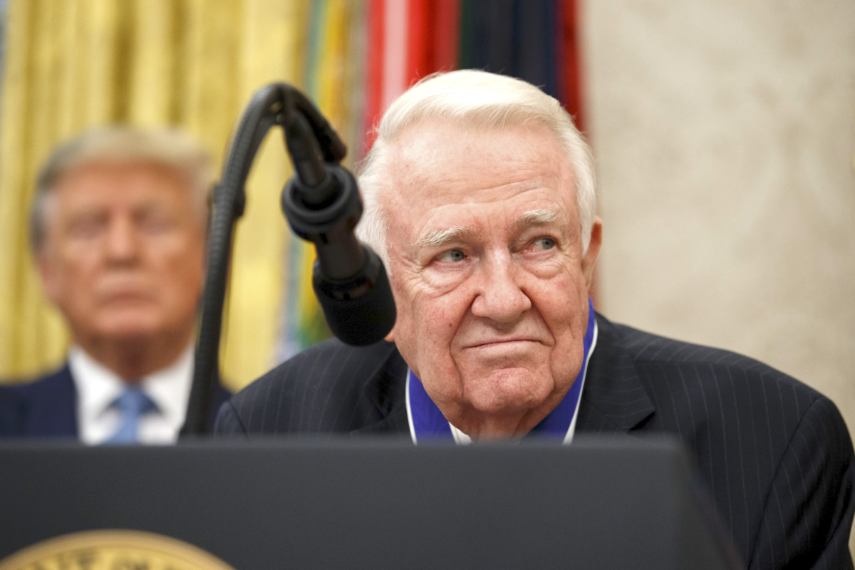 Former Attorney General Edwin Meese speaks, with President Donald Trump behind him, during a ceremony to present the Presidential Medal of Freedom to Meese, in the Oval Office of the White House, in Washington, on Oct. 8, 2019. (AP Photo/Alex Brandon)