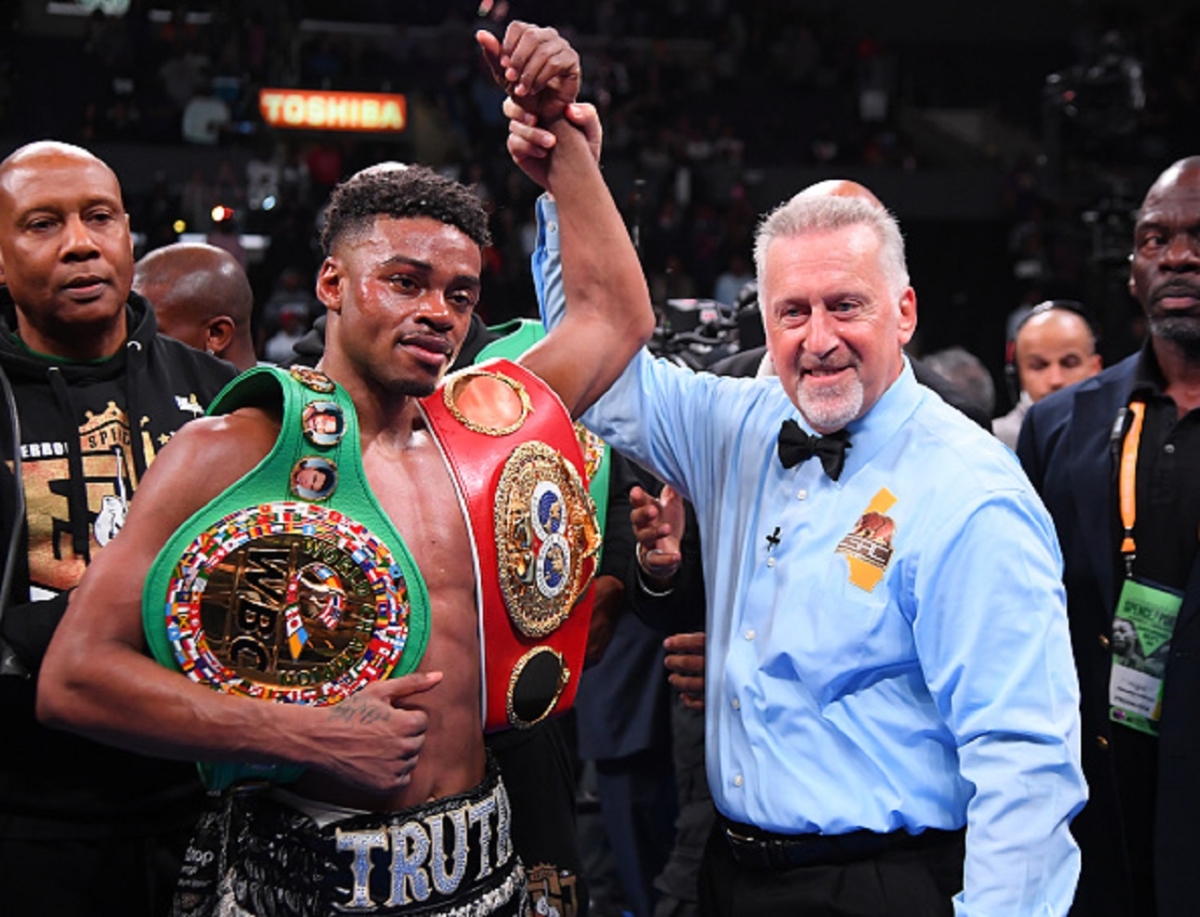 Referee Jack Reiss in the ring with Erroll Spence Jr. after he defeated Shawn Porter (not pictured) in their IBF & WBC World Welterweight Championship fight at Staples Center in Los Angeles, Calif., on Sept. 28, 2019. (Jayne Kamin-Oncea/Getty Images)