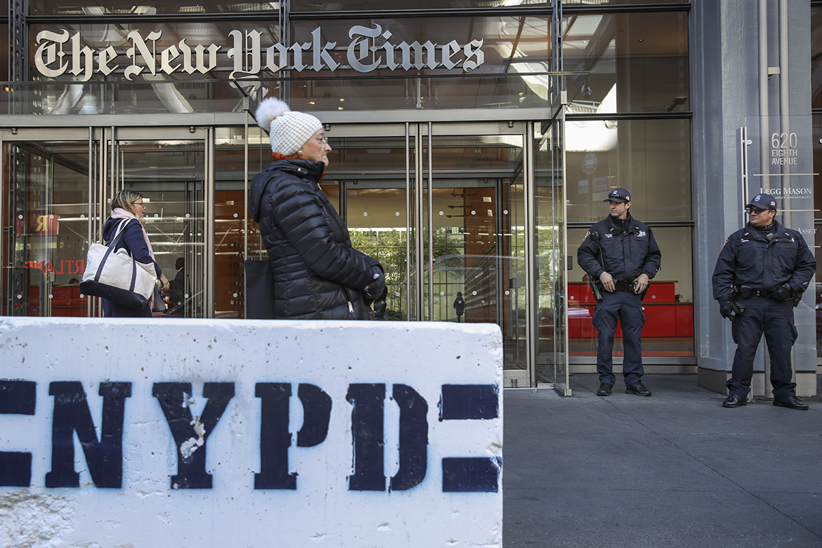 New York City Police officers stand outside the office of The New York Times in New York City on Oct. 25, 2018. (Drew Angerer/Getty Images)