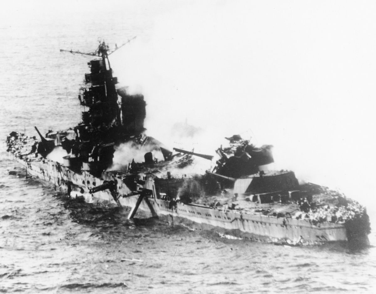 A Japanese heavy cruiser of the Mogami class lies low in the water after being bombed by U.S. naval aircraft during the Battle of Midway in May 1942. (AP Photo)