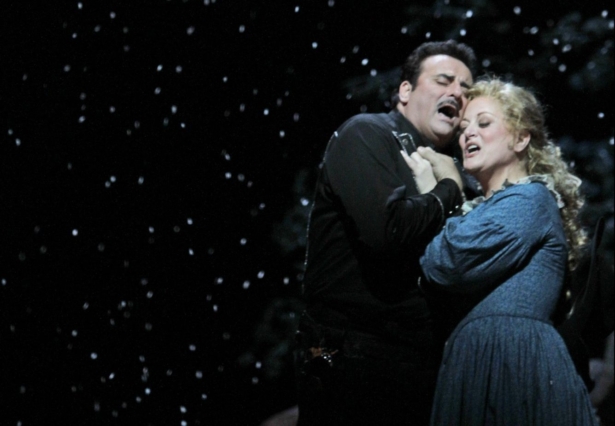 Marcello Giordani (L) performs as Ramerrez alongside Deborah Voigt performing as Minnie during the final dress rehearsal of Giacomo Puccini's "La Fanciulla del West," at the Metropolitan Opera in New York City on Dec. 3, 2010. (Mary Altaffer/AP Photo)