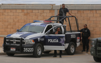 13 Police Killed in an Ambush by Suspected Cartel Gunmen in Violent Mexican State