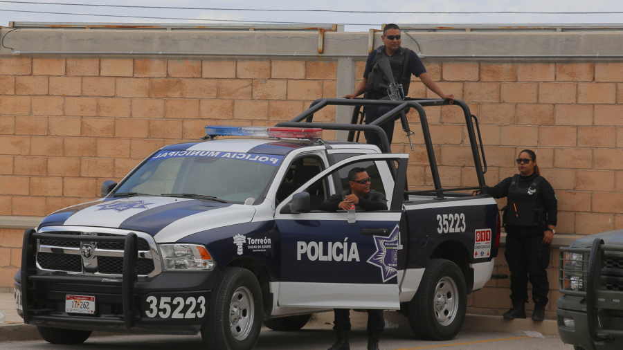 13 Police Killed in an Ambush by Suspected Cartel Gunmen in Violent Mexican State