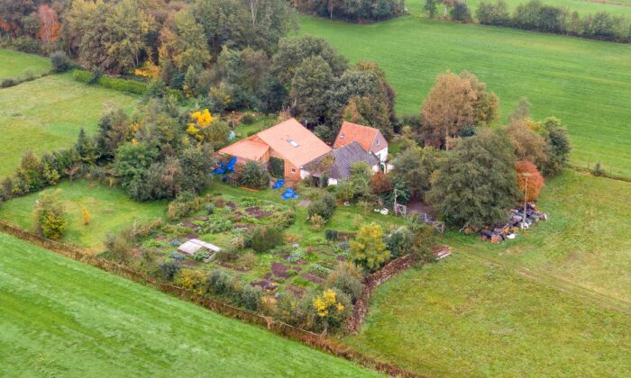 An aerial picture taken on Oct. 15, 2019 shows a view of the farm where a father and six children had been living in the cellar, In Ruinerwold, northern Netherlands. (WILBERT BIJZITTER/ANP/AFP via Getty Images)