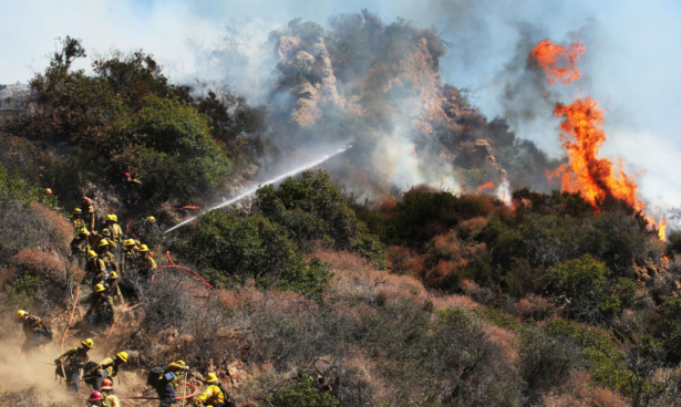 Firefighters work during the Palisades Fire, in the Pacific Palisades neighborhood in Los Angeles, Calif., on Oct. 21, 2019. (Mario Tama/Getty Images)