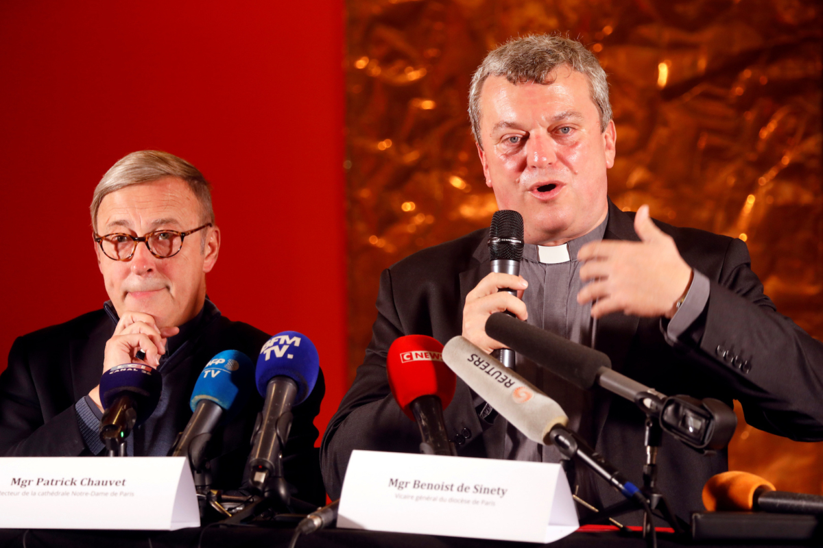 Notre-Dame de Paris Cathedral rector Patrick Chauvet and Vicar General Mgr Benoist De Sinety attend a news conference as work continues to stabilise the cathedral’s structure six months after a fire caused significant damage, in Paris, France on Oct. 15, 2019. (Charles Platiau/Reuters)