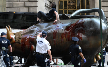 Climate Protesters Arrested After Throwing Fake Blood