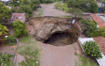 Phoenix Firefighters Search for Man Who Fell Into a Sinkhole in Mexico City