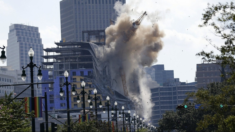 2 Leaning Cranes Toppled at Partly Collapsed New Orleans Hotel