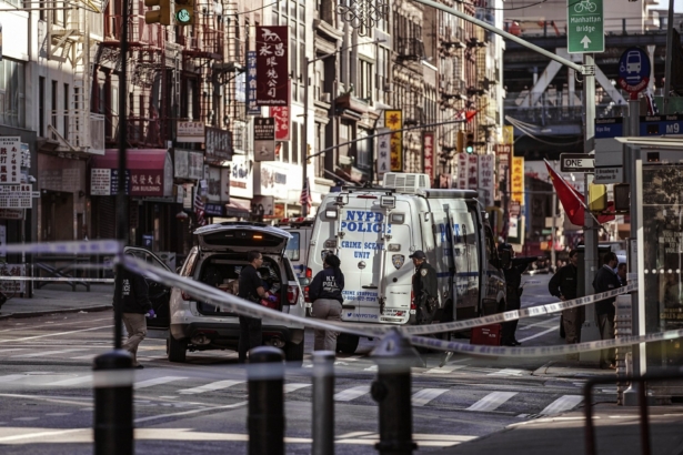 New York Police Department officers investigate the scene of an attack in Manhattan's Chinatown neighborhood in New York City on Oct. 5, 2019. (Jeenah Moon/AP Photo)