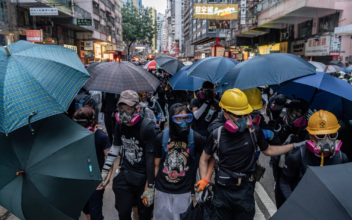 Hong Kong Protesters Defy Mask Ban to March in 18Th Straight Weekend of Demonstrations