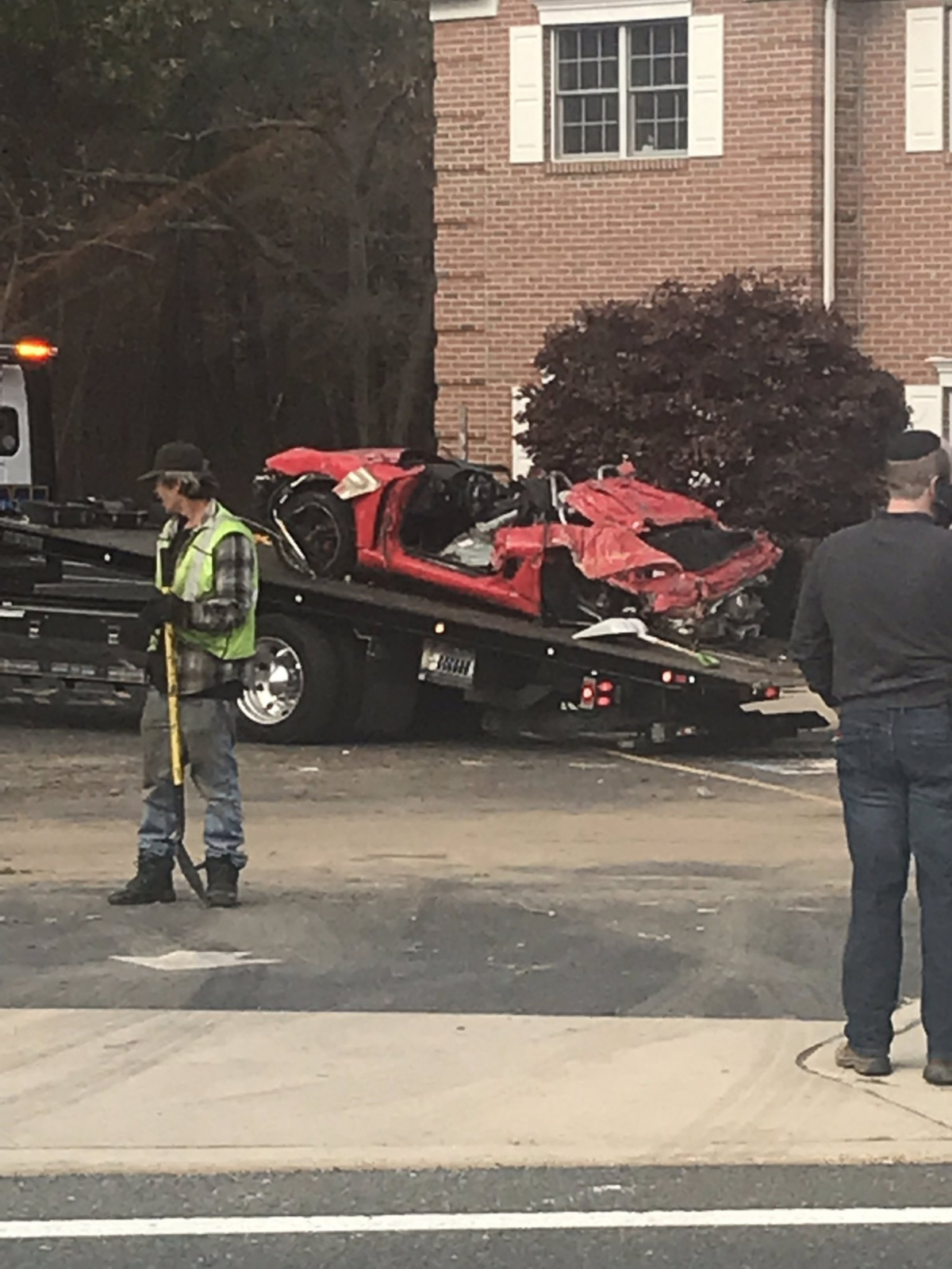 A red Porsche crashes into the second floor of a building in New Jersey on Nov. 10. (Courtesy of @jerzsteve/Twitter)