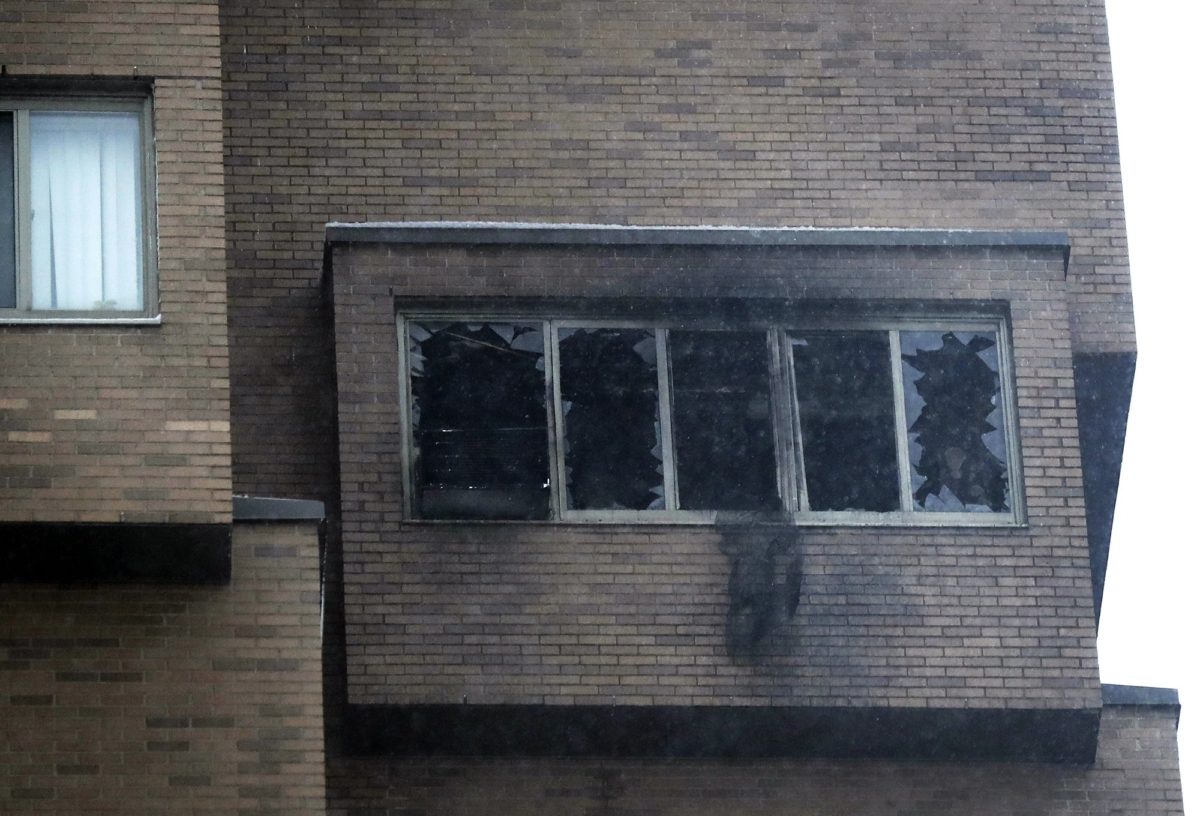 Broken windows and damage remain after a deadly fire at the high-rise apartment building on Nov. 27, 2019, in Minneapolis. (David Joles/Star Tribune via AP)