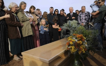 Last Victim of Mexico Border Killings Buried as Others Leave