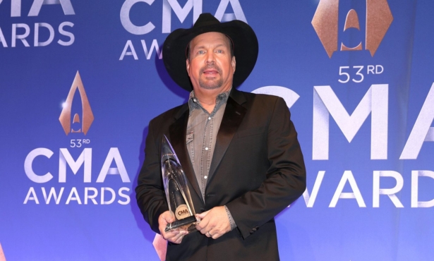 Garth Brooks poses with the CMA Award for Entertainer of the Year at the press room of the 53rd annual CMA Awards at the Bridgestone Arena in Nashville, Tenn., on Nov. 13, 2019. (Leah Puttkammer/Getty Images)