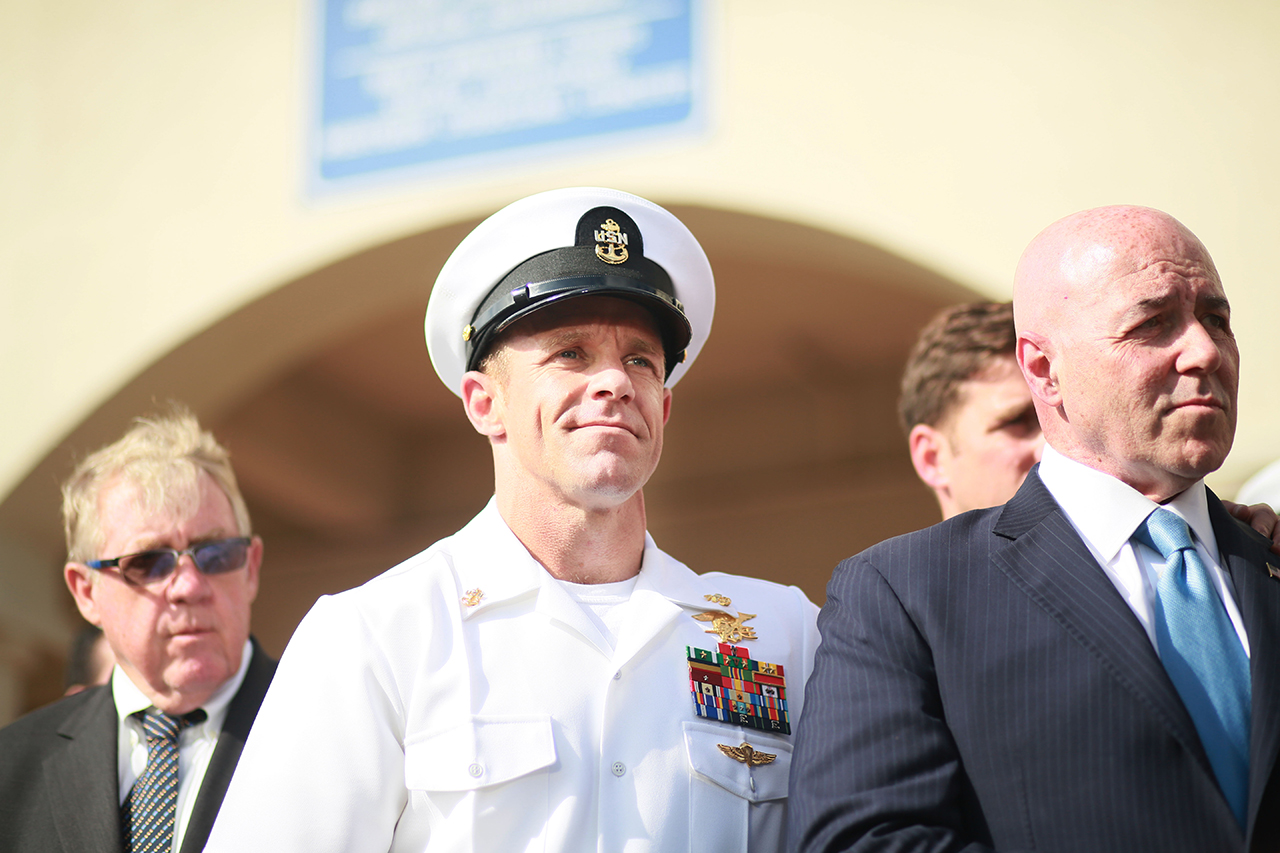 Navy Special Operations Chief Edward Gallagher (middle) celebrates after being acquitted of premeditated murder at Naval Base San Diego in San Diego, California, on July 2, 2019. (Sandy Huffaker/Getty Images)
