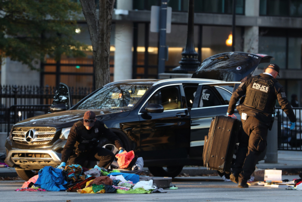 Members of the Secret Service examine belongings removed from a vehicle that tried to drive into a restricted area near the White House, on Nov. 21, 2019. (Mark Wilson/Getty Images)