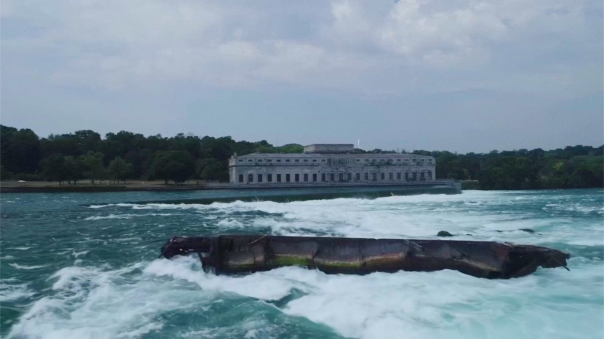 Waves crashing against the side of the "Iron Scow" ship in Niagara Falls, Ontario, Canada. (Still image from video via Reuters)