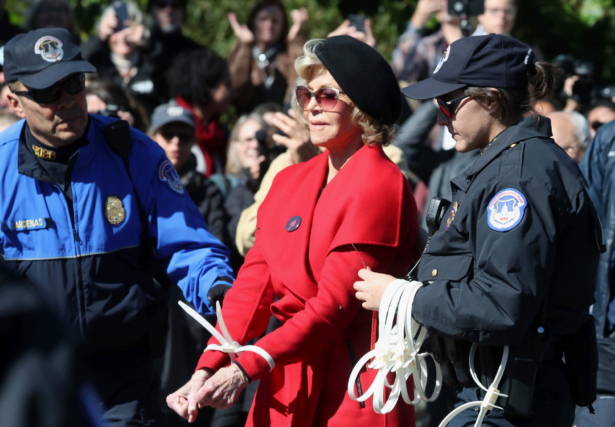 Actress Jane Fonda is arrested for blocking a street in front of the Capitol during a “Fire Drill Fridays” climate change protest and rally on Capitol Hill, in Washington on Oct. 18, 2019. (Mark Wilson/Getty Images)