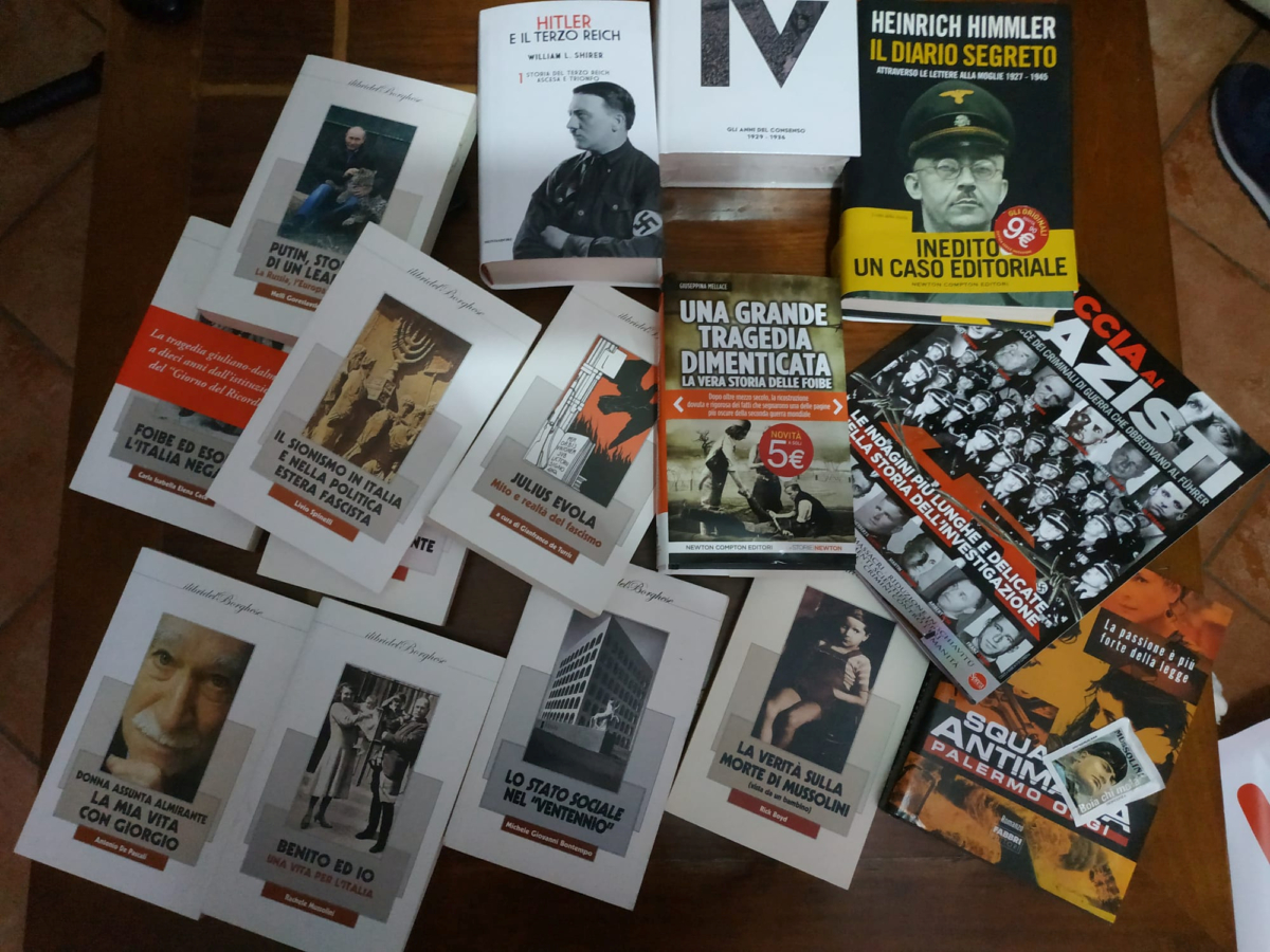 Italian police handout shows books that they say were seized in searches of properties of extreme political groups who planned to create a new Nazi party, in an unidentified location in Italy in a picture released on Nov. 28, 2019. (Polizia di Stato/Handout via REUTERS)