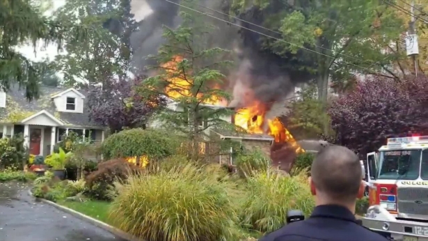 The NTSB is investigating a plane crash that caused a house fire in New Jersey. (Michael Yonone/Facebook)