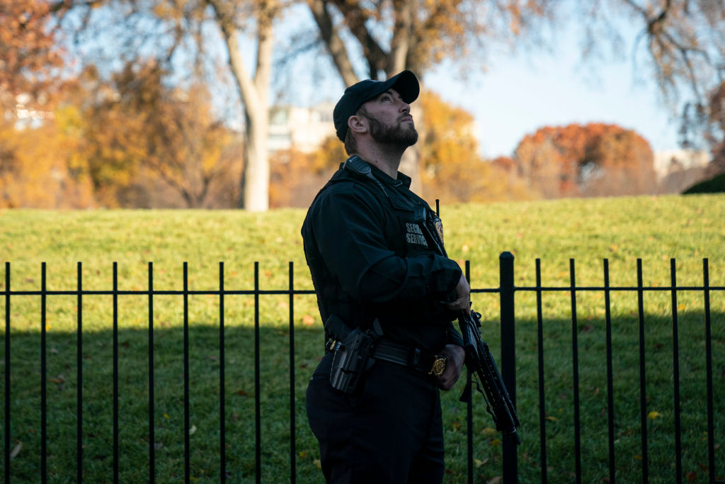 A member of the Uniformed U.S. Secret Service stands guard outside of the Brady Press Briefing Room at the White House in Washington on Nov. 26, 2019. (Drew Angerer/Getty Images)