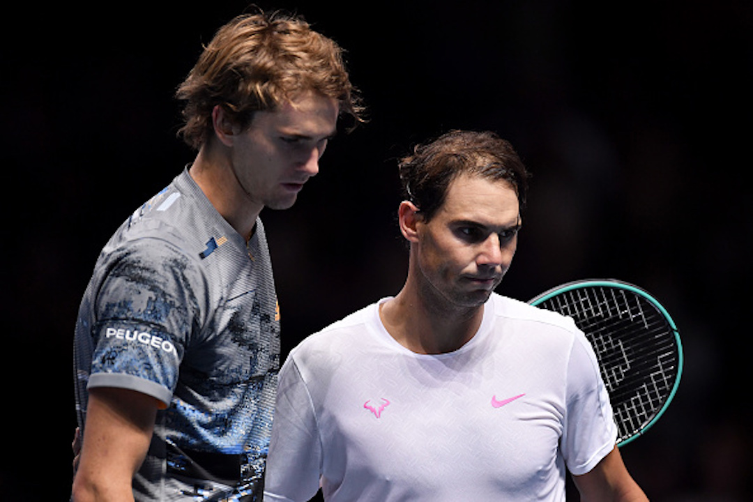 Rafael Nadal of Spain and Alexander Zverev of Germany embrace at the net after their singles match during Day Two of the Nitto ATP World Tour Finals at The O2 Arena in London, England,on Nov. 11, 2019. (Justin Setterfield/Getty Images)