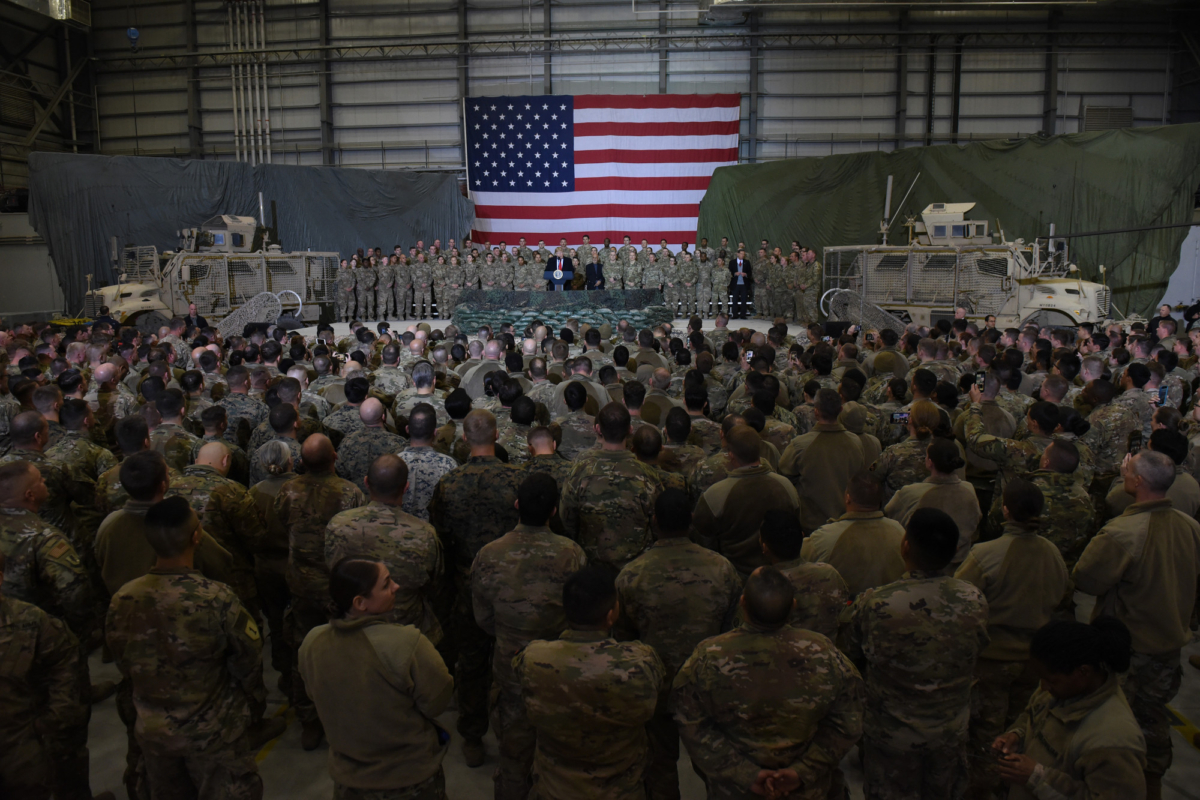 President Donald Trump and Afghanistan President Ashraf Ghani speak to American soldiers during a surprise Thanksgiving day visit at Bagram Air Field in Afghanistan on Nov. 28, 2019. (Olivier Douliery/AFP via Getty Images)