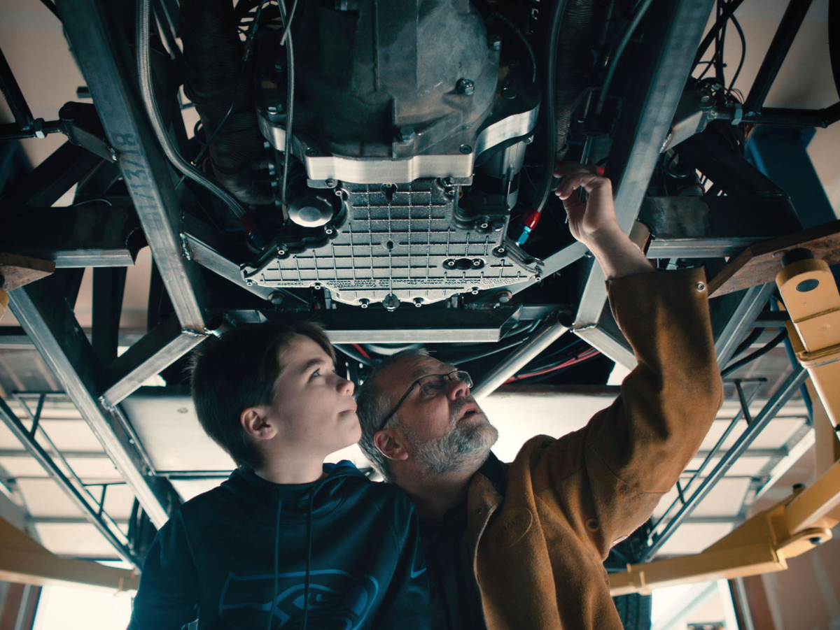 Sterling and Xander Backus working on their 3D-printed Lamborghini Aventador replica project. (Courtesy of Sterling Backus)