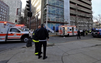 Woman ‘Very Likely’ Killed Herself and Her Two Young Children at Boston Garage, Official Says