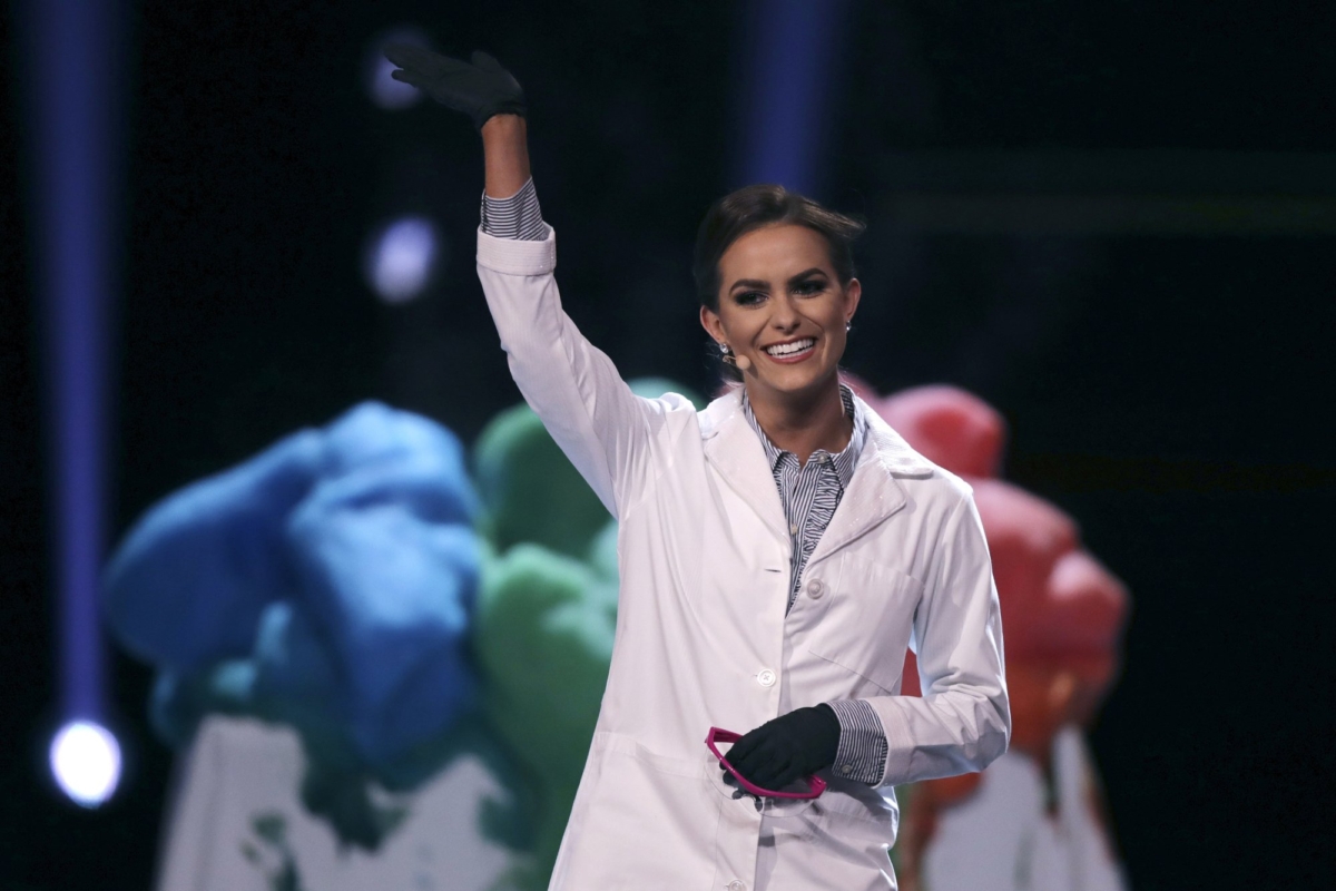Camille Schrier, of Virginia, waves after performing a science experiment prior to winning the Miss America competition at the Mohegan Sun casino in Uncasville, Conn., on Dec. 19, 2019. (Charles Krupa/AP Photo)