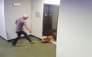 Video Shows a Man Rescuing Neighbor’s Dog After Its Leash Got Stuck in Elevator Doors