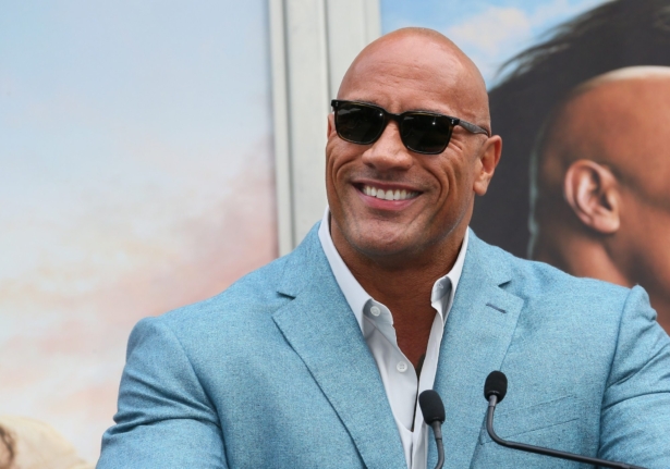 Dwayne Johnson attends a Hand and Footprint ceremony honoring Kevin Hart at the TCL Chinese Theatre IMAX in Hollywood, Calif., on Dec. 10, 2019. (Jean Baptiste Lacroix/Getty Images)