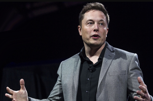 Tesla Motors CEO Elon Musk unveils the company's newest products, in Hawthorne, Calif. on April 30, 2015. (Ringo H.W. Chiu/AP Photo)