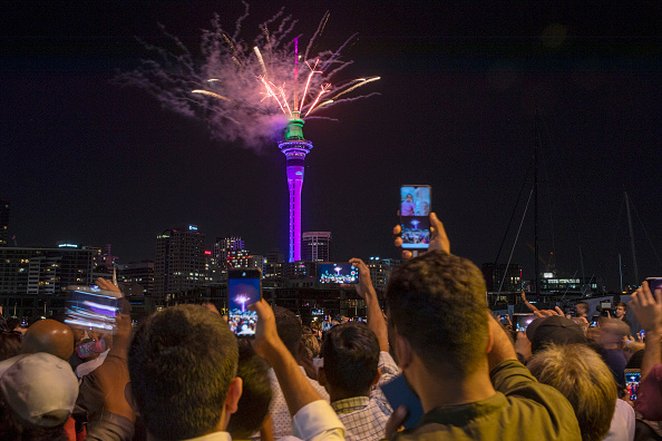 Crowds watch the fireworks from the SkyTower during Auckland New Year's Eve celebrations in Auckland, New Zealand on Jan. 1, 2020. (Dave Rowland/Getty Images)