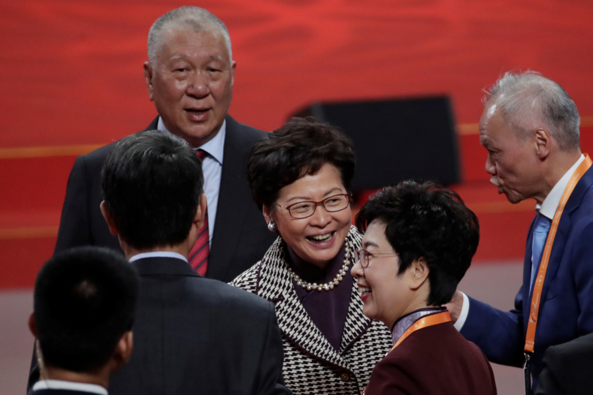 Hong Kong Chief Executive Carrie Lam and Macau's first chief executive Edmund Ho attend a cultural performance in Macau, China, on Dec. 19, 2019. (Jason Lee/Reuters