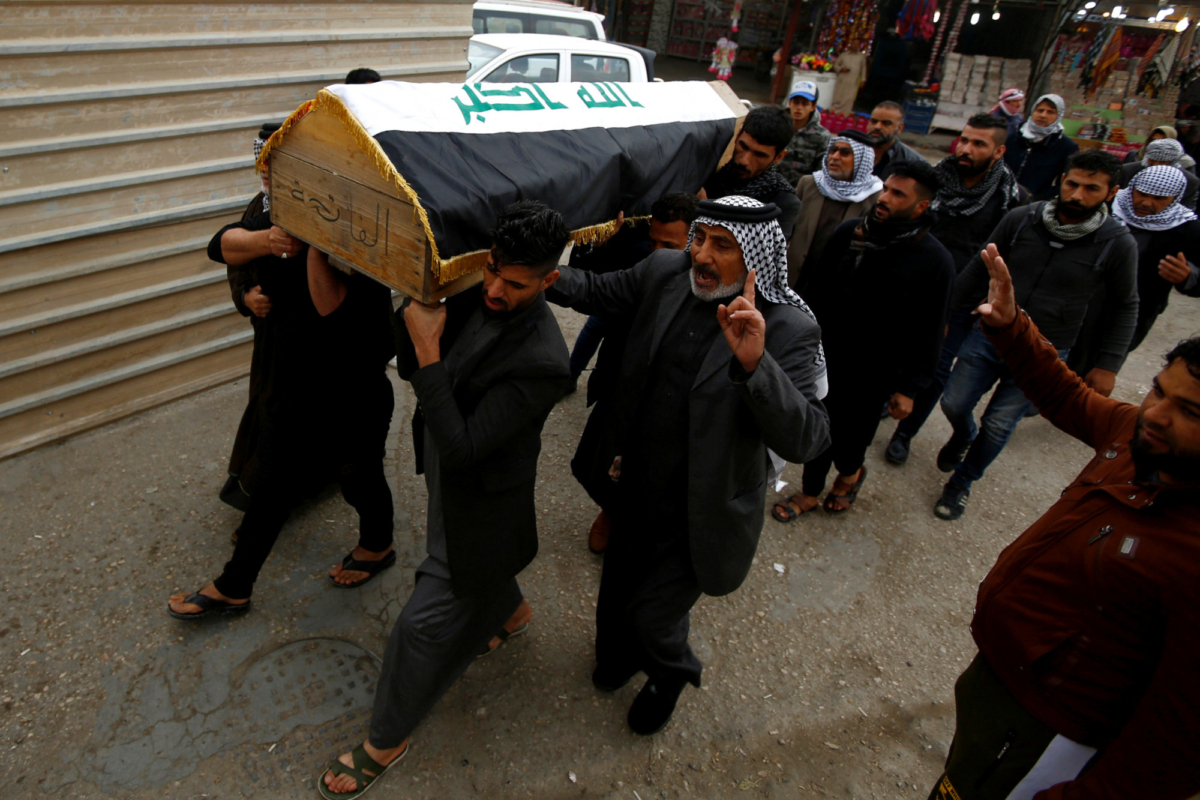 Mourners carry the coffin of a demonstrator, who was killed at an anti-government protest overnight in Baghdad, during the funeral in the holy city of Najaf, Iraq on Dec. 7, 2019. (Alaa al-Marjani/Reuters)