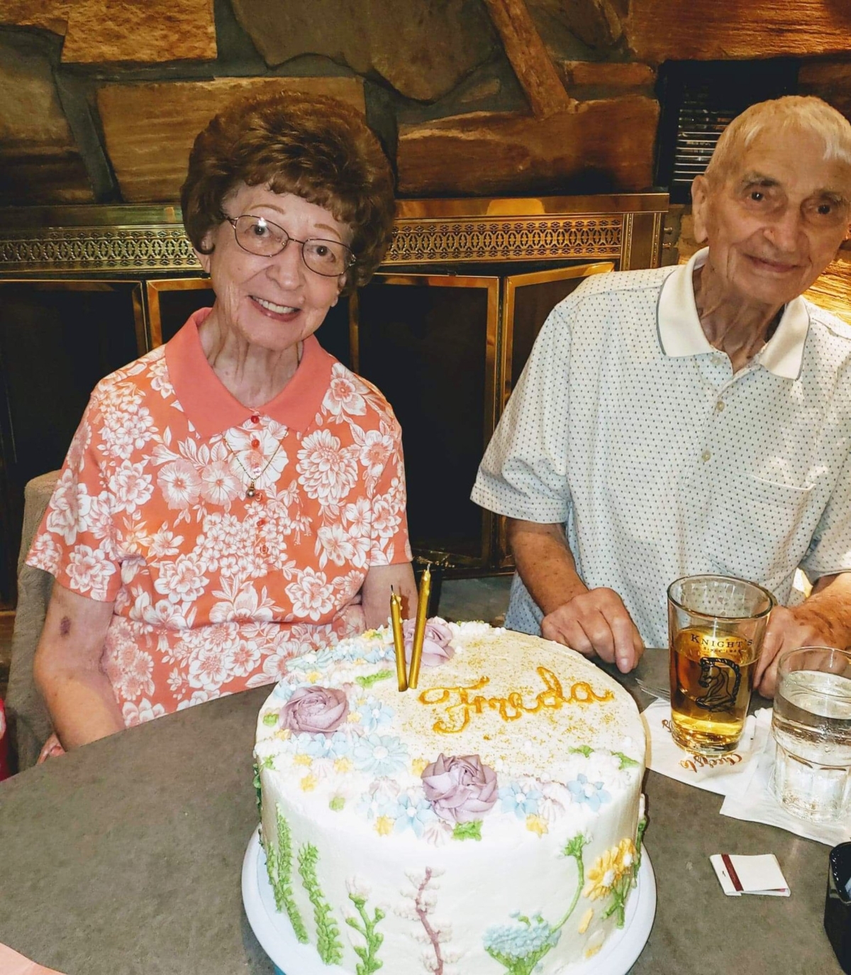 This June 2019 photo provided by Leah Smith shows Les and Freda Austin of Jackson, of Michigan, pose for a photo at a birthday party. (Leah Smith via AP)