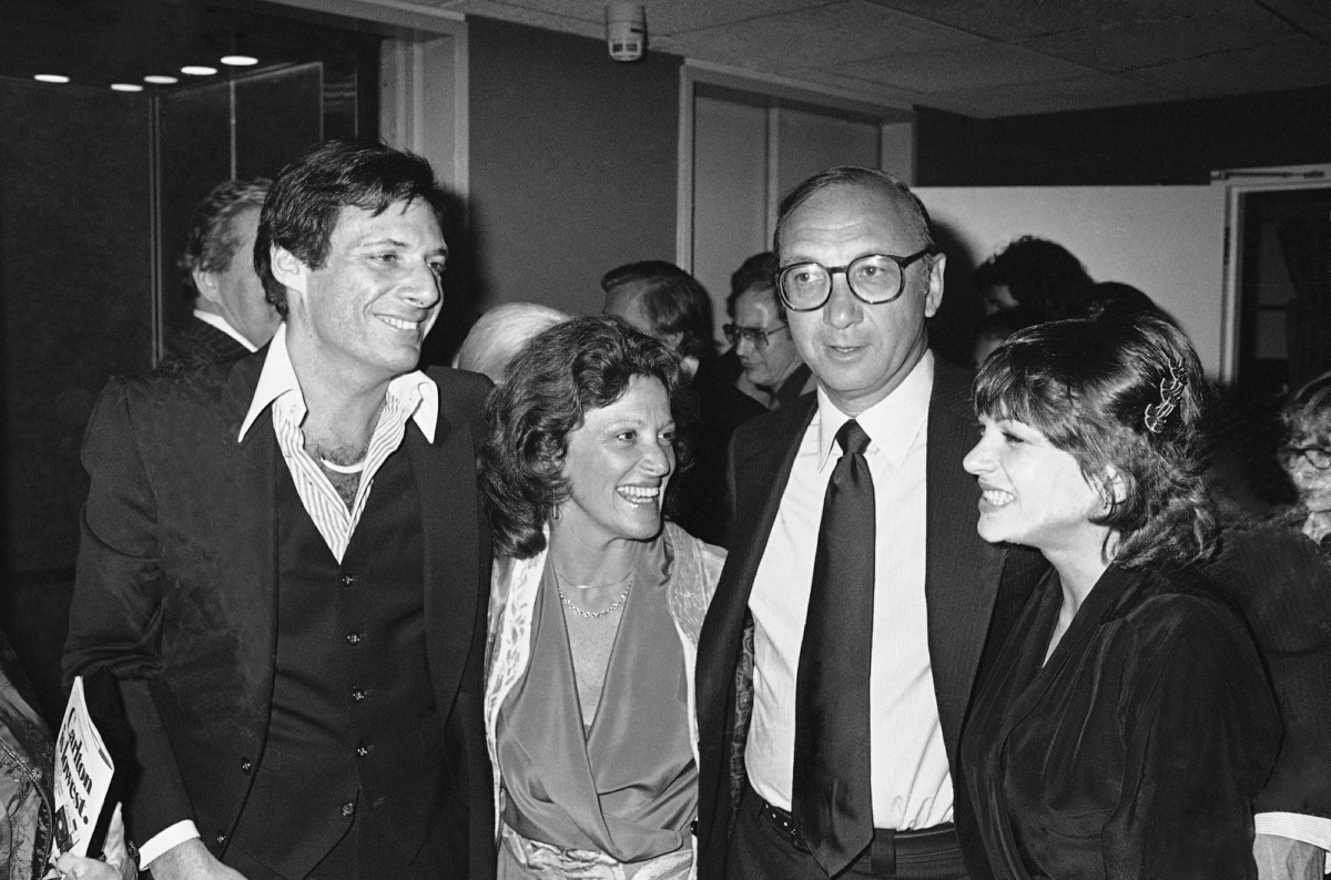 Ron Leibman, from left, his wife Linda Lavin, playwright Neil Simon and Dinah Manoff in New York following the opening of the play "I Ought to be in Pictures," on April 3, 1980. (Ray Stubblebine/AP Photo)