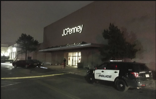 Crime scene tape is pulled across the parking lot near an entrance to the J.C. Penney store at Town Center of Aurora mall late Friday, in Aurora, Colo. on Dec. 27, 2019. (Quincy Snowdon/The Aurora Sentinel via AP)
