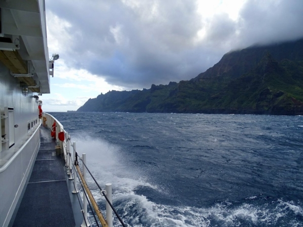 Coast Guard Cutter William Hart moves toward the Na Pali Coast on the Hawaiian island of Kauai on Dec. 27, 2019, the day after a tour helicopter disappeared with seven people aboard. (Lt. j.g. Daniel Winter/U.S. Coast Guard via AP)