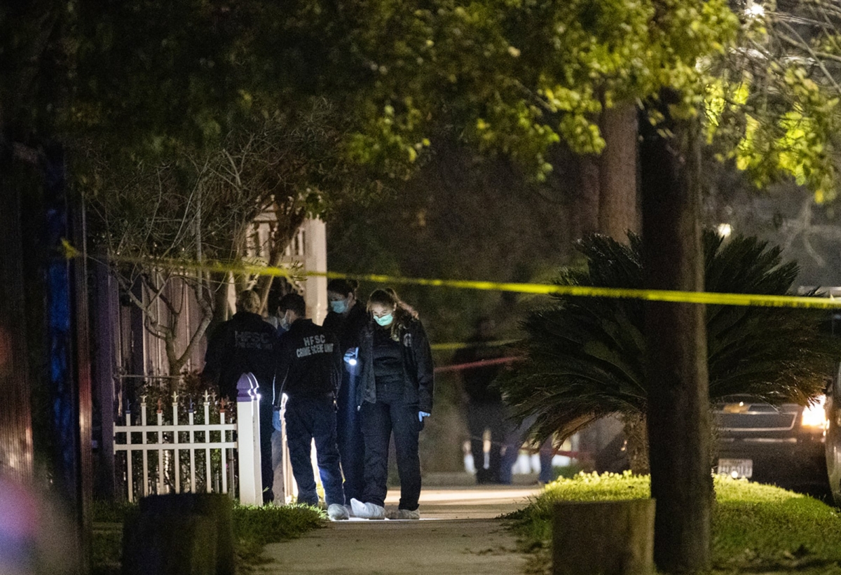 Authorities investigates the scene of a shooting in Houston on Dec. 7, 2019. (Marie D. De Jesus/Houston Chronicle via AP)