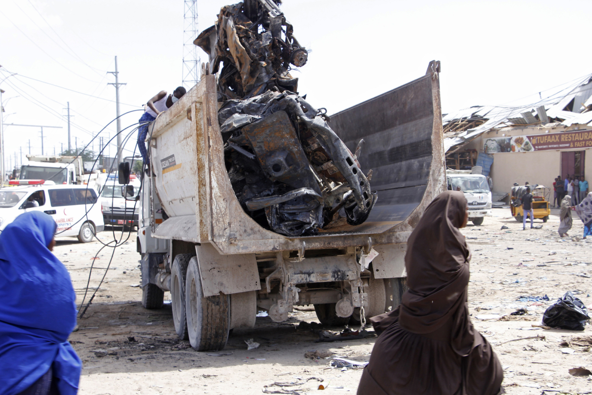 A truck carries wreckage of car used in car bomb in Mogadishu, Somalia, on Dec, 28, 2019. (Farah Abdi Warsame/AP Photo)