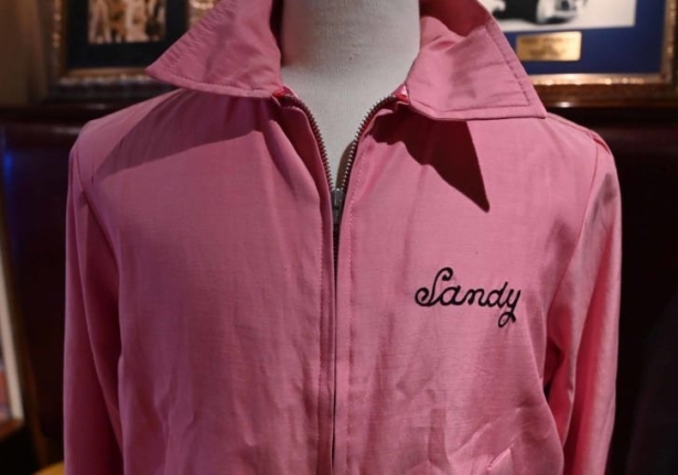 Olivia Newton-John’s "Pink Ladies" jacket from the movie sold for $50,000, which was 25 times the estimated price and the iconic black leather jacket from the movie "Grease" sold for $243,200 last month at a charity auction. (Timothy A. Clary/AFP via Getty Images)