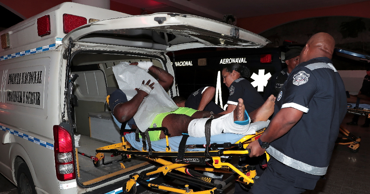 An injured inmate is carried on a stretcher into a hospital by police paramedics after a shootout among inmates at La Joyita prison, in Panama City, Panama Dec. 17, 2019. (Reuters/Erick Marciscano)